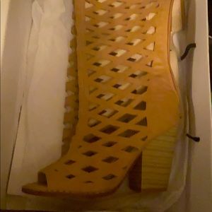 Knee high cut out boots